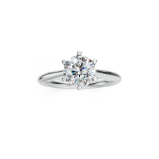 Timeless Platinum Solitaire Ring with Floral Inspired Setting