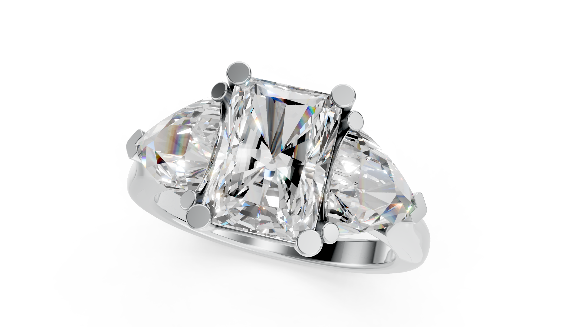 Exquisite Platinum Three-Stone Ring with Radiant and Pear Diamonds
