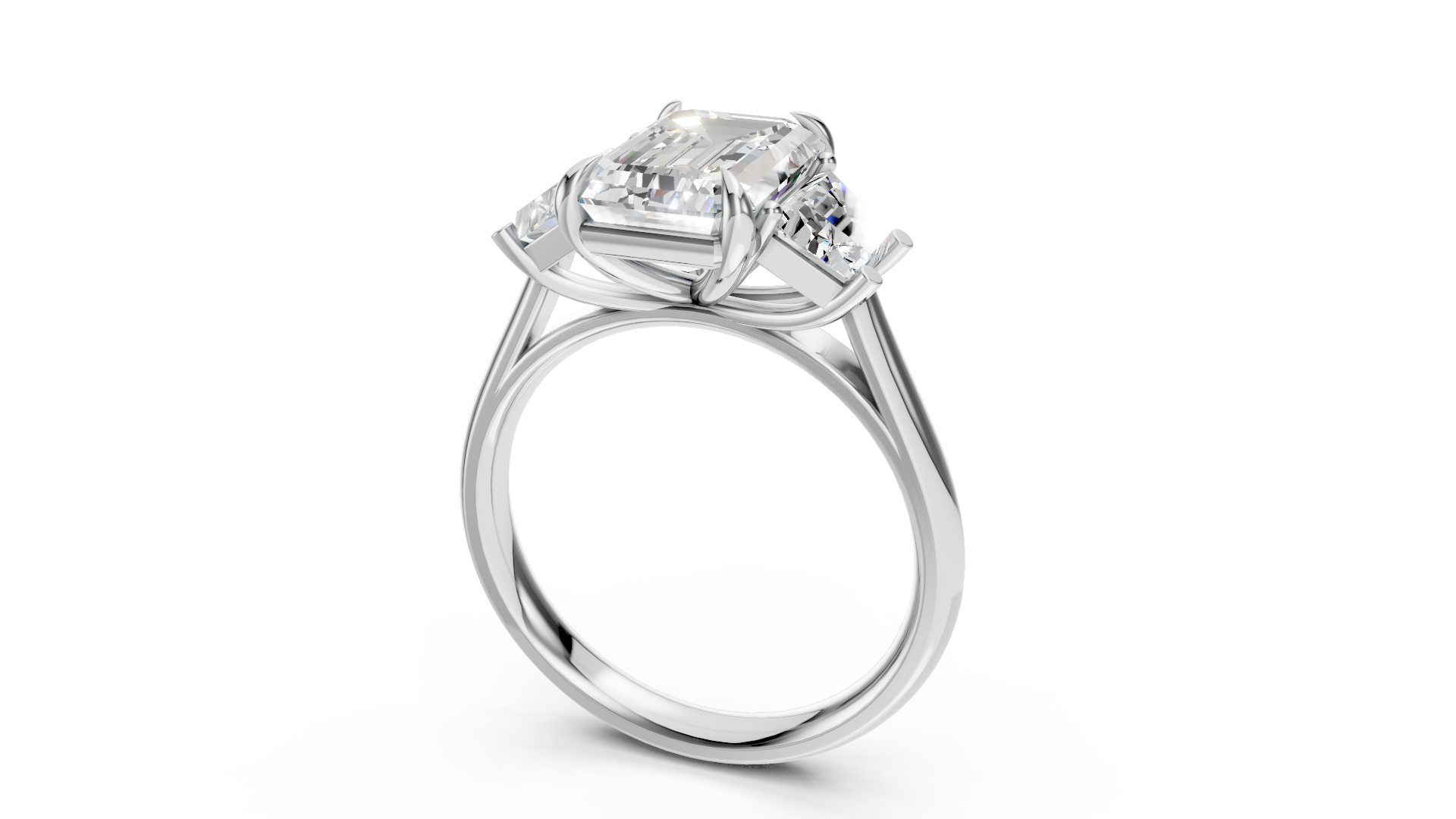Magnificent Platinum Three-Stone Ring with Emerald Cut Diamonds